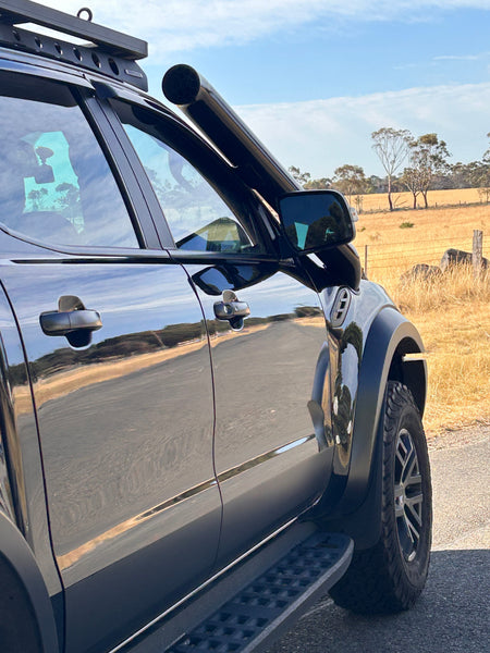 Close-up of Canna Fabrication twin snorkels on a black Ford Ranger Raptor PX3