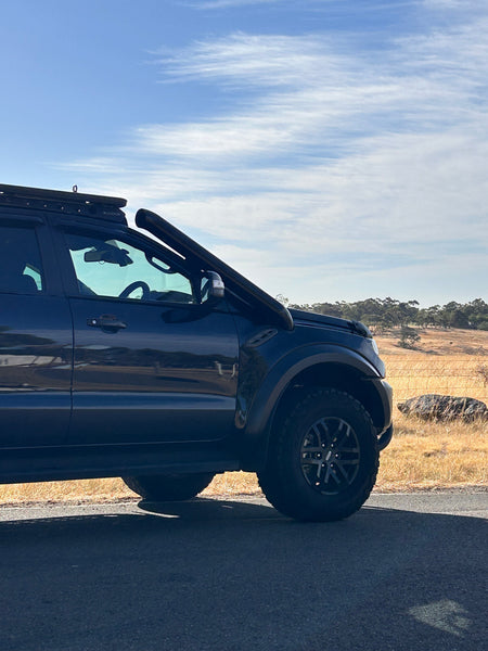 Side view of a Ford Ranger Raptor PX3 fitted with Canna Fabrication twin snorkels