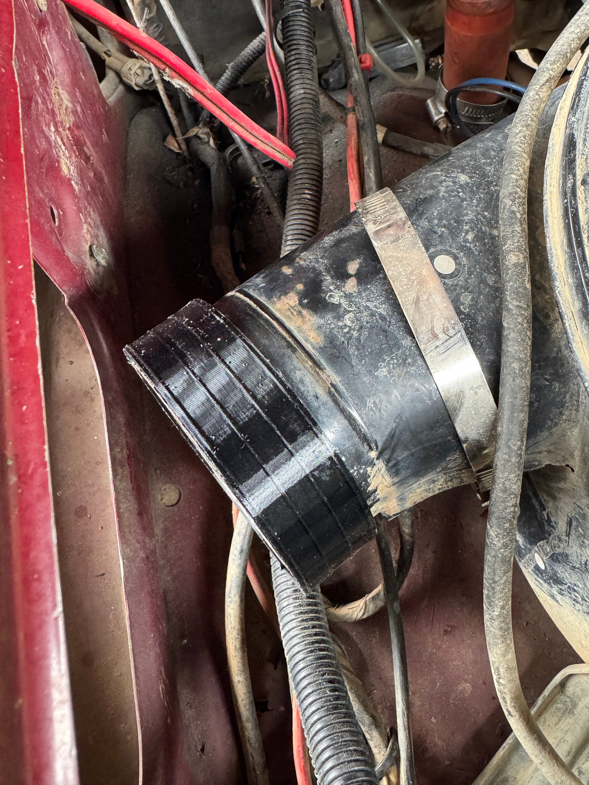 3.5" to 3.2" rubber reducer fitted to a Toyota 80 Series factory airbox