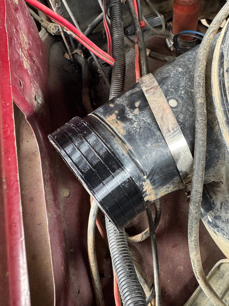 3.5" to 3.2" rubber reducer fitted to a Toyota 80 Series factory airbox