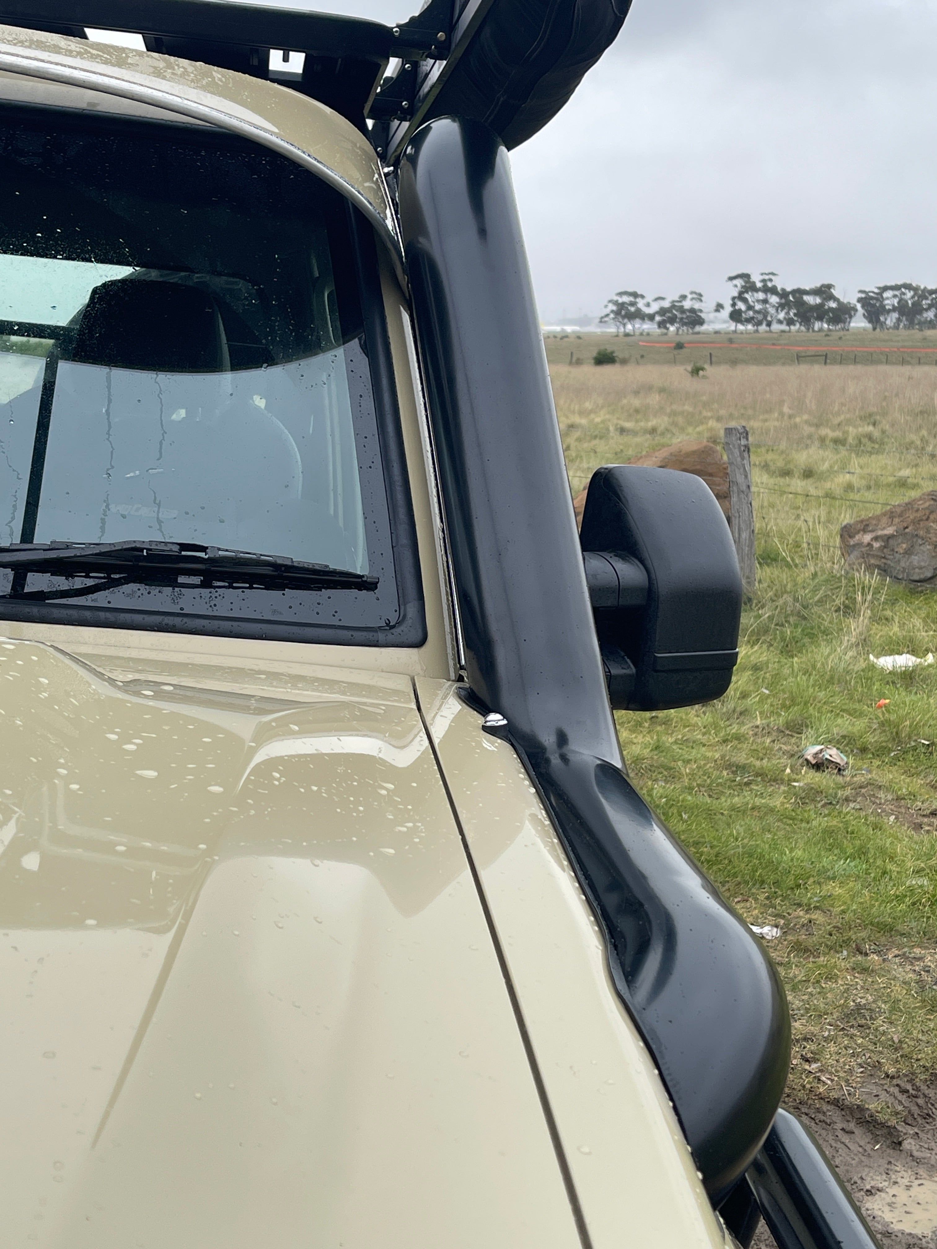 Close-up of one snorkel from the Canna Fabrication 5 inch twin set on a LandCruiser 70 Series