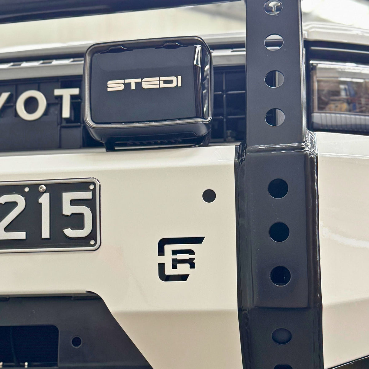 This is an image of the new Raslarr Dallas Bull Bar Toyota Landcruiser Prado 250 Series White Black fog lights right hand side