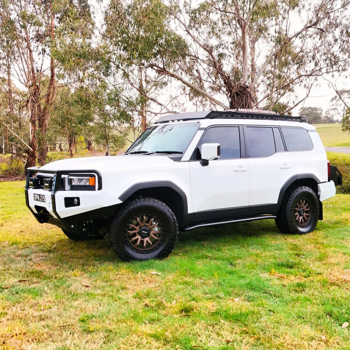 This is an image of the new Raslarr Dallas Bull Bar Toyota Landcruiser Prado 250 Series White Black full car image side on