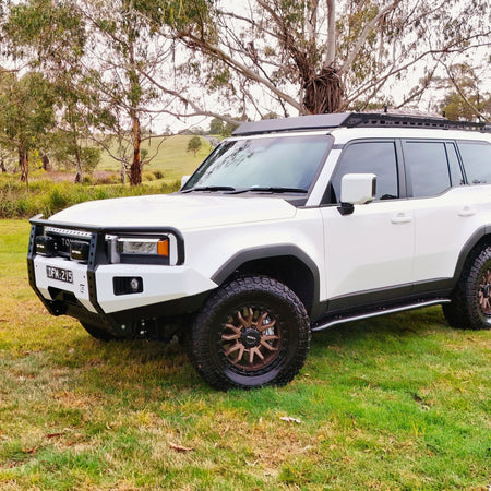 This is an image of the new Raslarr Dallas Bull Bar Toyota Landcruiser Prado 250 Series White Black full car image side on