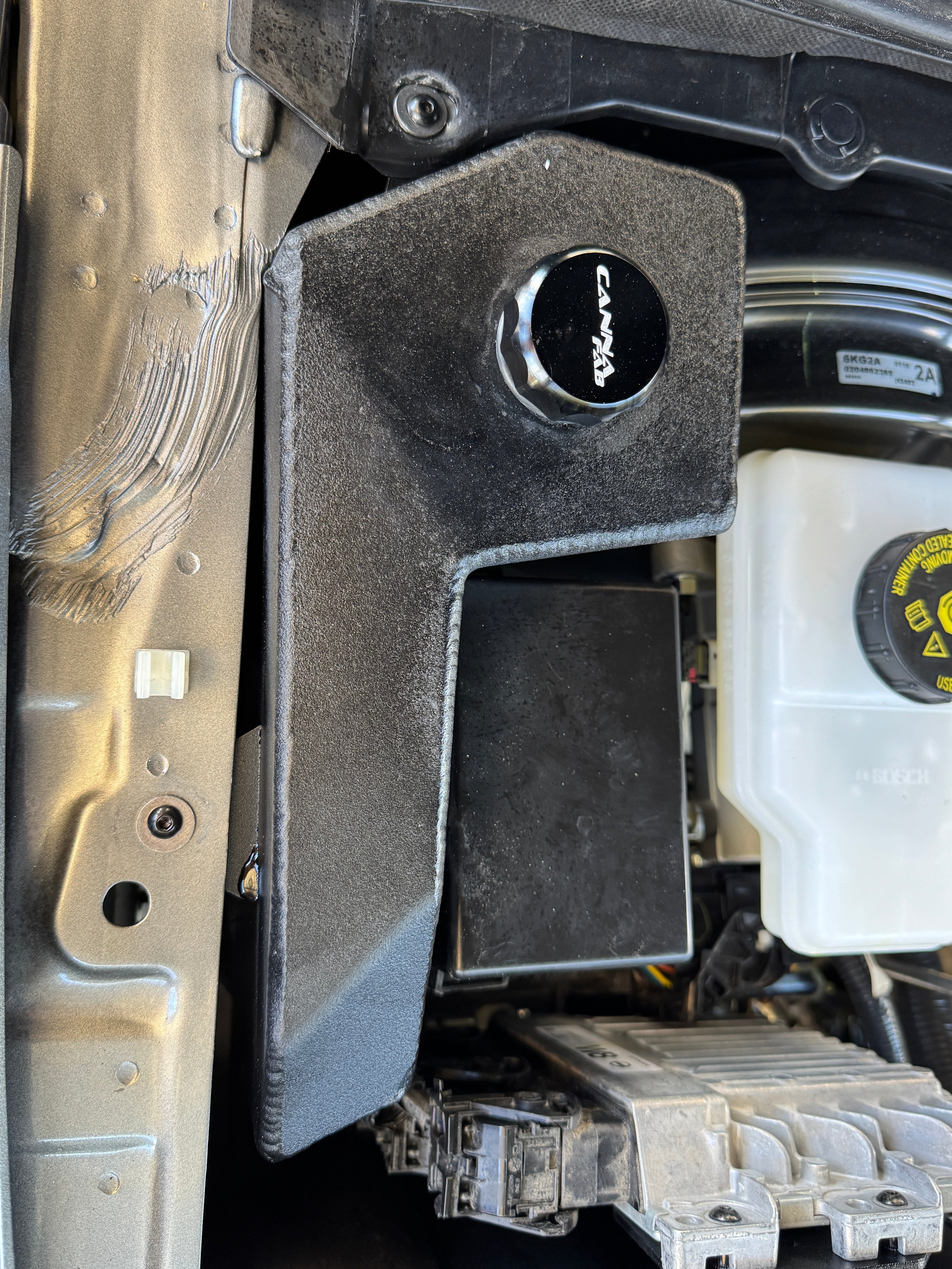 Representative image: Canna Fabrication washer bottle reservoir shown. Ford Next-Gen Ranger version may differ slightly.