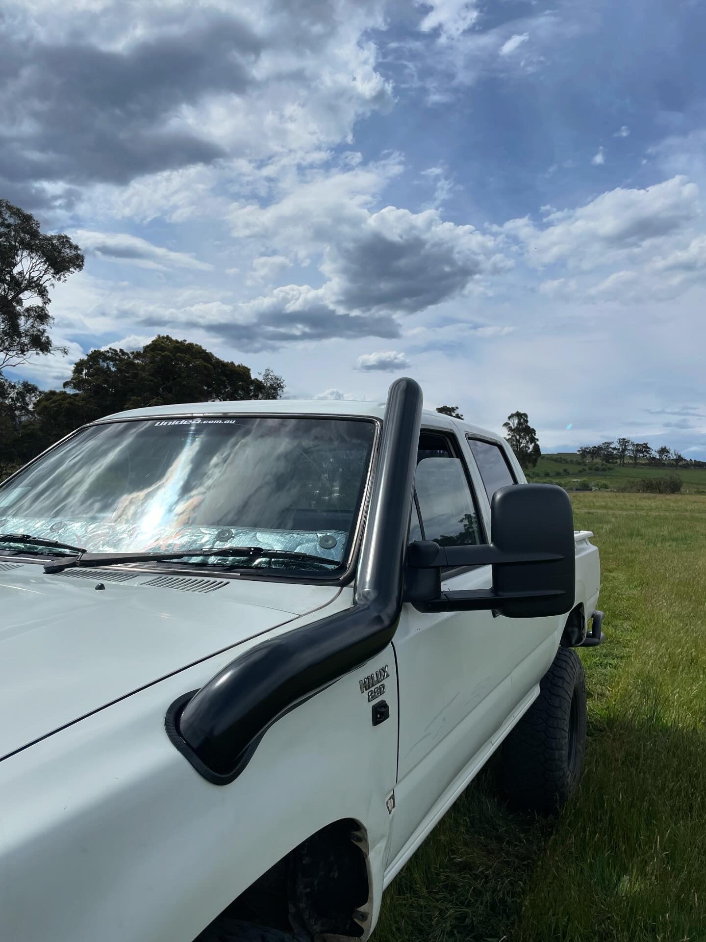 Toyota Hilux LN106 4" Long-Entry Stainless Snorkel by Canna Fabrication — brushed silver