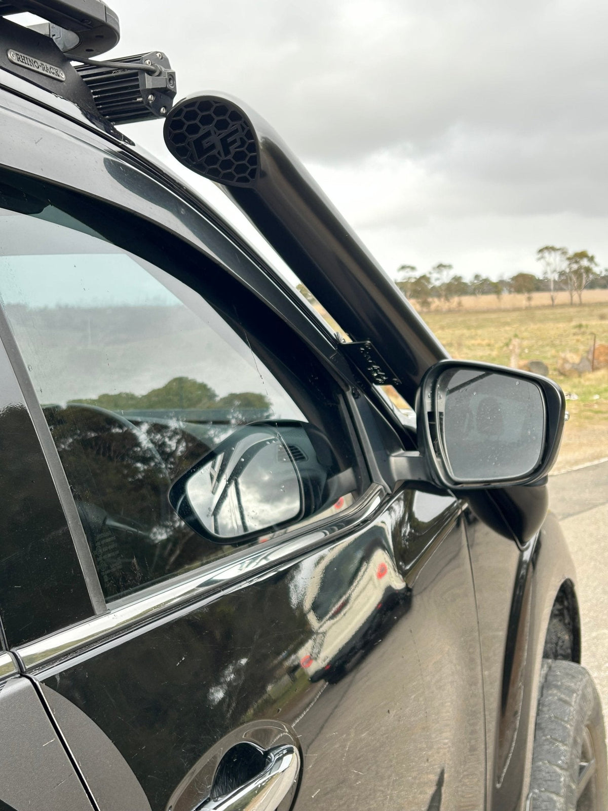 Nissan Navara NP300 D23 Short-Entry Stainless Snorkel by Canna Fabrication — brushed silver