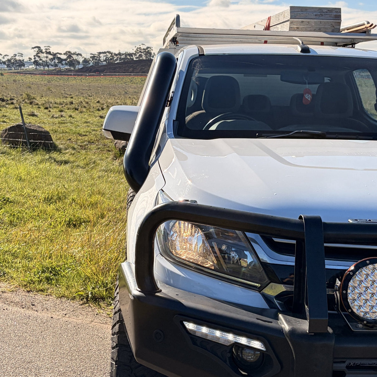 Holden Colorado RG teardrop twin stainless snorkels by Canna Fabrication — front quarter