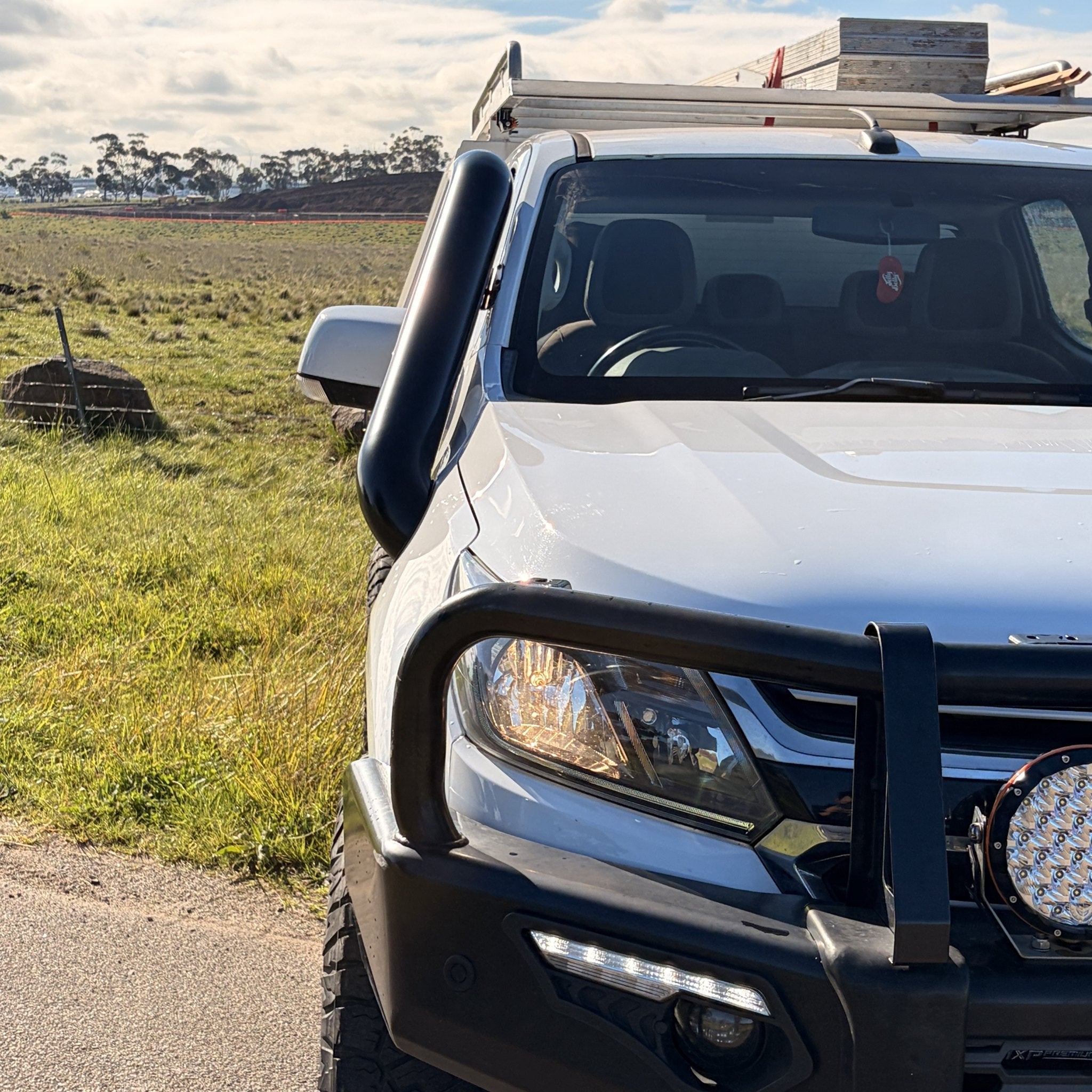 Holden Colorado RG teardrop twin stainless snorkels by Canna Fabrication — front quarter