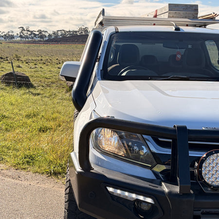 Holden Colorado RG teardrop twin stainless snorkels by Canna Fabrication — front quarter