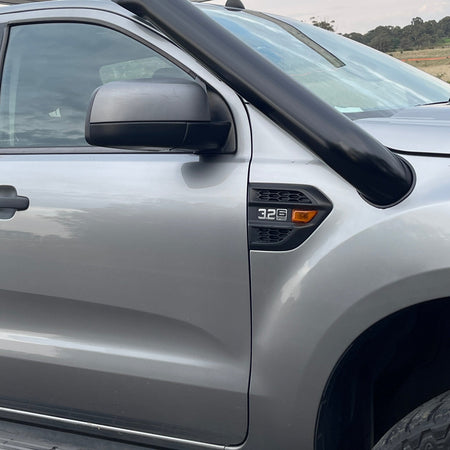 Close-up of the Canna Fabrication short-entry snorkel body on a silver Ford Ranger PX